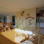 jardin d'hiver avec espace repas et coin détente bibliothèque ouvrant sur le jardin jardin d'hiver avec espace repas et coin détente bibliothèque ouvrant sur le jardin